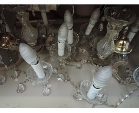 A pair of modern ceiling light fittings, chandeleir style