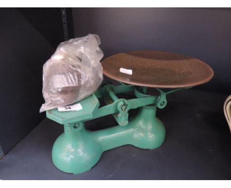 A set of vintage painted cast kitchen balance scales, with weights