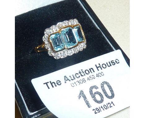 9ct gold ring set with blue topaz and diamonds, approx. UK size Q