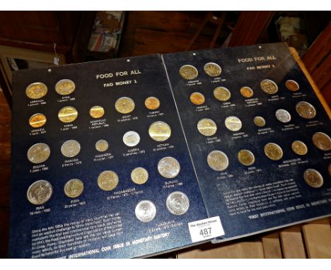 Two sets of the first three cards of the FAO World Food For All Money Collection coin set