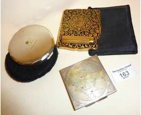 Silver and gilt powder compact with engraved map of India, Indian cities marked with rubies, early 20th c. Together with an a