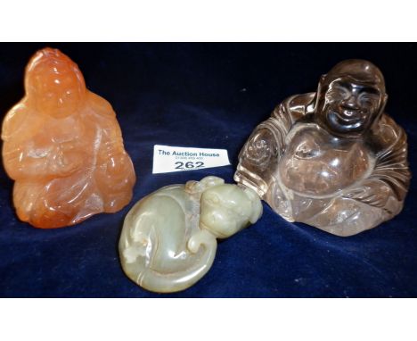 Chinese carved rock crystal buddha, 6cm high, another and a jade dog