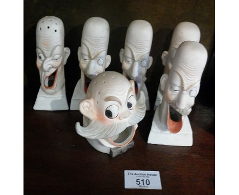 Schafer and Vater bisque barbershop singers figural novelty match holders or ashtrays, together with a similar match or cockt