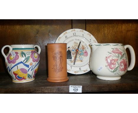 Royal Doulton Bunnykins teaching clock, Poole Pottery handled vase, Torquay Terra Cotta vase, and a Susie Cooper jug