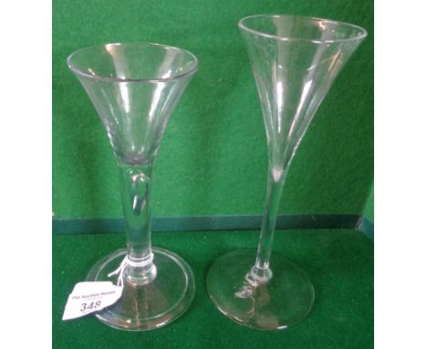 A wine glass having trumpet bowl on a plain drawn stem with an air tear and folded conical foot, 6.5" high, c. 1745, and a fi