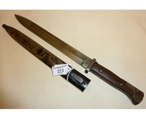 German 1884 pattern, c. WW1 bayonet Seitengewehr. Marked as Soemmerda 7.J.P.182, and measuring approximately 16" long in scab