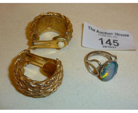 Chunky vintage goldtone Christian Dior hoop earrings and a silver ring