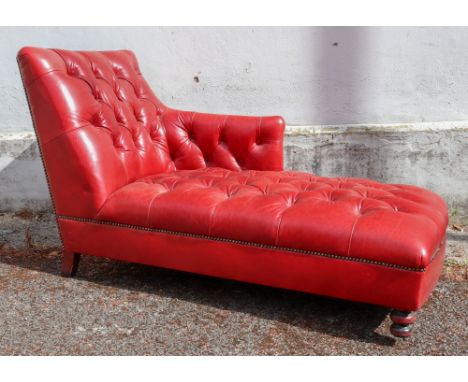 A John Lewis Hamlet chaise longue, button down upholstered in burgundy hide, close nailed, 150cm wide x 72cm deep x 86cm high