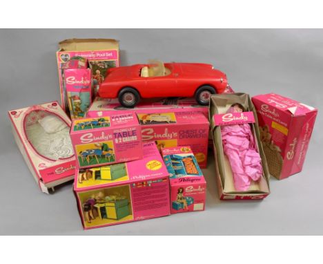 Sindy Doll; a large collection including Sindy's own car, hairdryer, bed, bedroom furniture, sink unit, table and chairs, dol