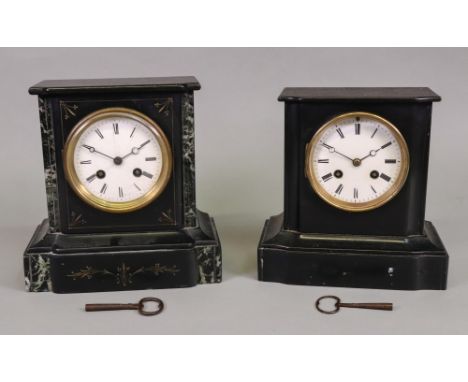 A Victorian black and verde antico marble cased mantel clock, the twin train movement striking on a bell, 20.5cm wide and ano