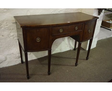 A Regency Style Mahogany Sideboard, circa early 20th century, Having a drawer flanked with a cupboard door and a cellarette d