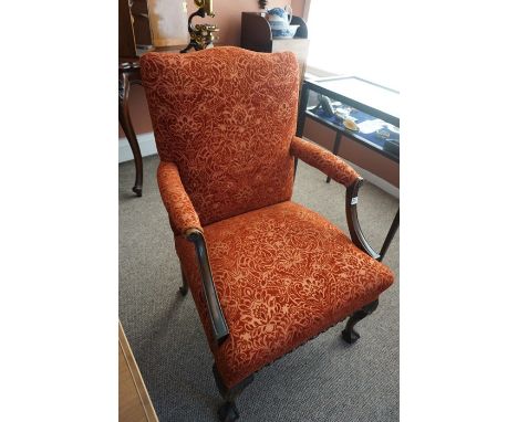 A Pair of Chippendale Style Mahogany Armchairs, Upholstered in red floral damask, raised on ball and claw feet, 96cm high, (2