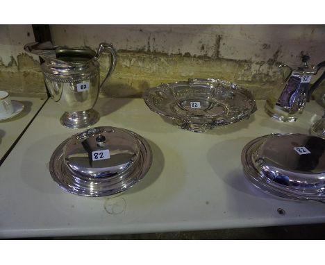 A Mixed Lot of Silver Plated Wares, To include a large jug, a four piece tea service, a Victorian cake basket with a swing ha