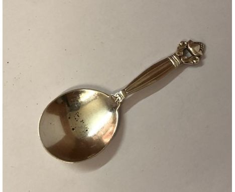 Georg Jensen, A Danish Silver Acorn Pattern Caddy Spoon, circa 1930s, stamped 925, GI, and GS, date letter m, 10cm long 