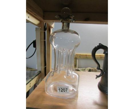 A silver topped decanter