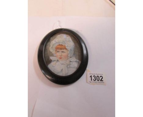 A portrait miniature of a child