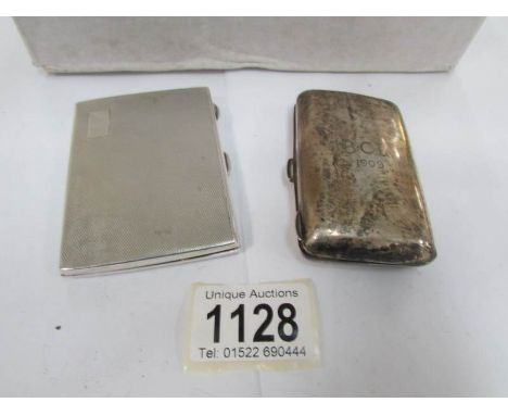 A silver cigarette case and a silver vesta case one Birmingham 1931/31, J Gloster Ltd and the other Chester 1909, James Deaki