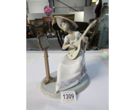 A Lladro girl playing guitar - Sweet song, #6408