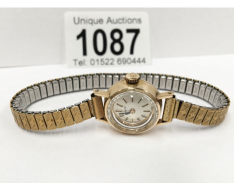 A 9ct gold ladies Tissot watch in working order