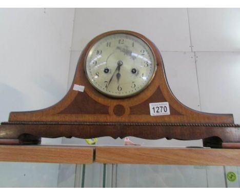 A Napoleon hat mantel clock