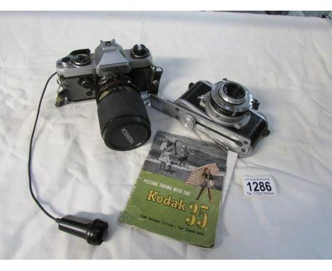 A Yashica camera with 35-105 mm lens and a Kodak 35 camera