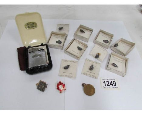 A Ronson Cadet lighter in original container and with original box together with sterling silver coffee beans and 3 badges