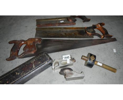 A quantity of old woodworking tools including 2 tenon saws and 2 shaping planes