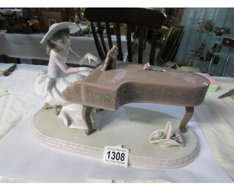 A Lladro girl playing piano - Spring recital #6452