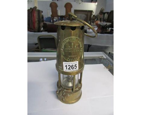 A miner's lamp 'Projector Lamp & Lighting Co.,'