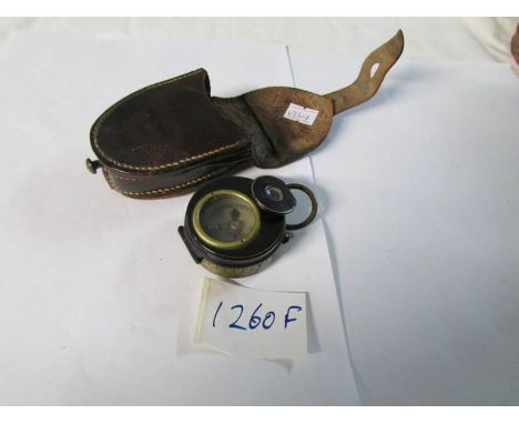 A military compass in leather case