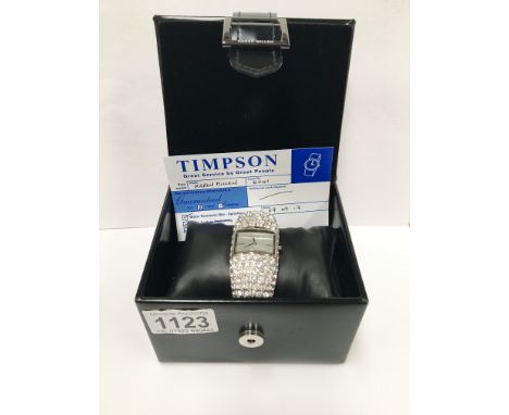 A Karen Millen diamonte bangle wrist watch with box, 12 month battery and guarantee from Timpson