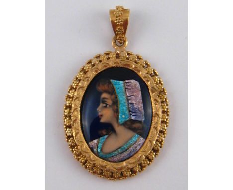 A yellow metal (tests 18 carat gold) portrait miniature pendant, approx 4cm drop, 7.8 gms.
