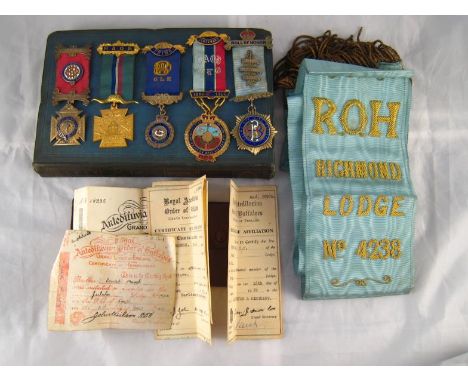 A book "The antiquities of Freemasonry" by George Oliver, London 1843 and certificates, together with five masonic jewels and