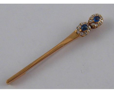 A yellow metal (tests 18 carat gold) sapphire and old cut diamond brooch, the stones of good colour, brooch approx 53mm long,