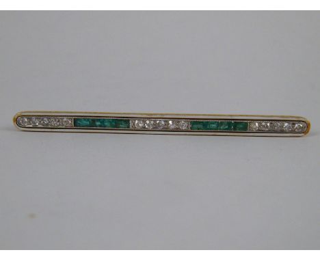 An 18 carat gold, emerald, old brilliant cut diamond and enamel (chipped) bar brooch, the stones of fine colour measuring app