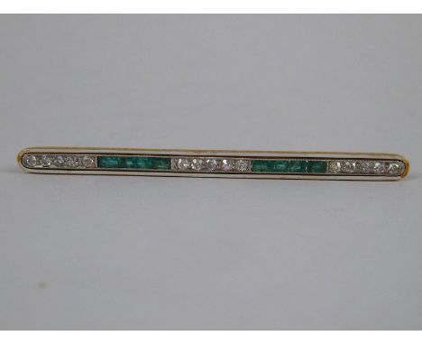 An 18 carat gold, emerald, old brilliant cut diamond and enamel (chipped) bar brooch, the stones of fine colour measuring app