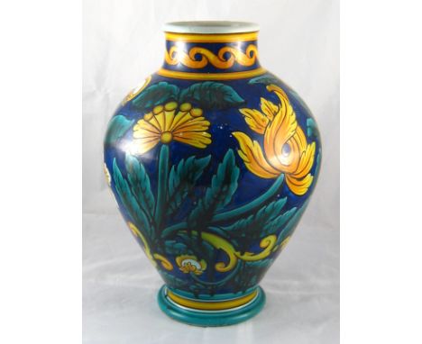 A large ceramic vase with bright floral glaze decoration,  Cantagalli signature to base  . Ht.35cm. 