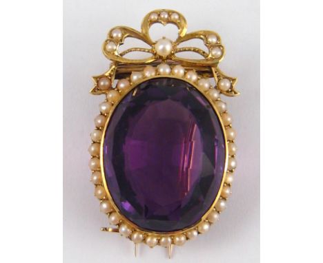 A fine antique 15 carat gold, amethyst and seed pearl brooch, amethyst approx 25 x 20mm, 17.1 gms.

