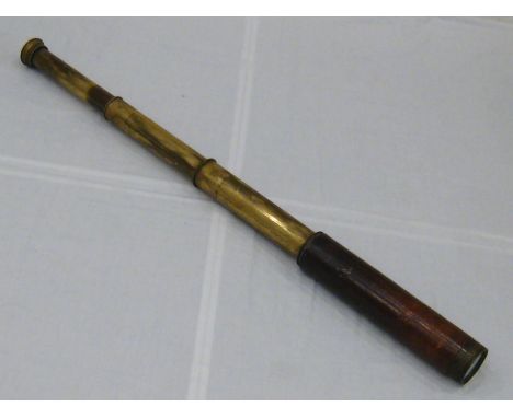 A leather cased three draw brass telescope by Broadhurst Clarkson & Co. London. 75cm. extended. 