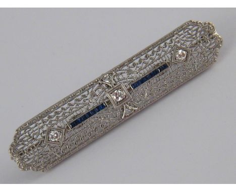 A fine Art Deco sapphire and diamond brooch, marked 14K PL for 14 carat gold and platinum, unascribed maker's mark, approx 5.