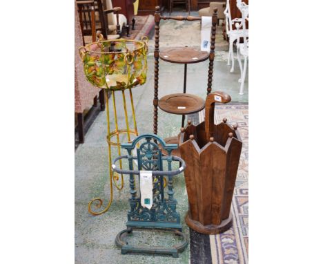 **CATALOGUE AMENDMENT - THE CHAIR IS NOT PART OF THIS LOT***A cast metal walking stick stand, of small proportions; an oak fo