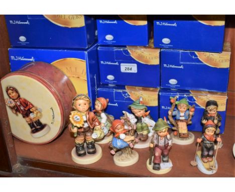 Goebel Hummel Figures - Sunflowers, My Love (902) limited edition 3883/7500; Playmates (58); Grandpa's Boy (562); Skier (594)