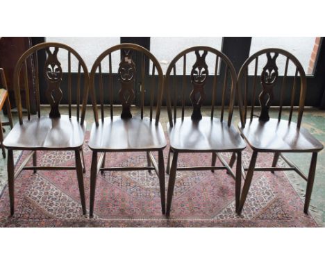 A set of four Ercol style dining chairs (4)