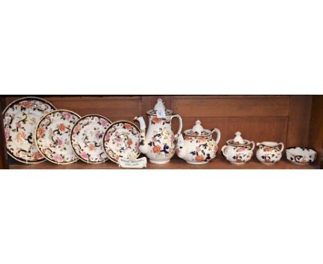 A Mason's Ironstone Mandalay pattern teapot, coffee pot, sucrier, cream jug, sugar bowl, four graduated plates, point of sale