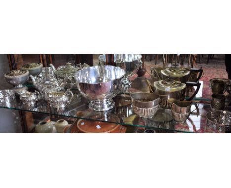 Plated Ware - a large Sheffield plated punch bowl; a three piece tea service comprising teapot, milk jug and sugar bowl; anot