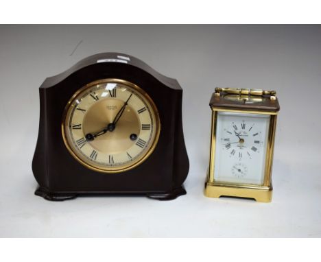 A Saint Suzanne French L' Epée chiming carriage clock, white dial, Roman and Arabic numerals , brass glass case; a Smith's Ba