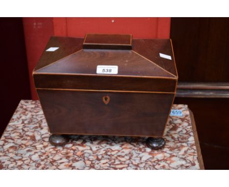 A 'George III' style sarcophagus shaped tea caddy, 26.5cm wide