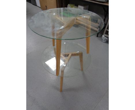 A pair of contemporary glass topped lamp tables 