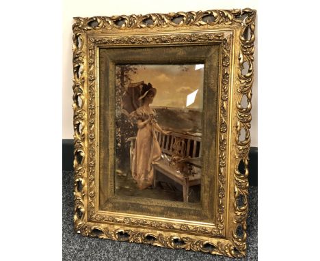 A crystoleum of a Lady Holding a Parasol Standing Next to a Bench, 25 cm x 16 cm, framed. 