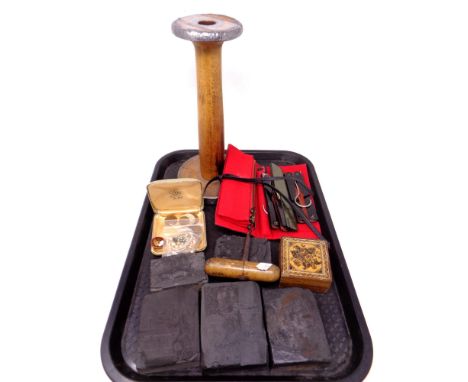 A tray containing antique wooden corkscrew, candlestick, woodblock printing blocks etc
